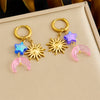 Wholesale Stainless Steel Round Earrings With Goldplated Star Moon Sun Pendant In Simple Style