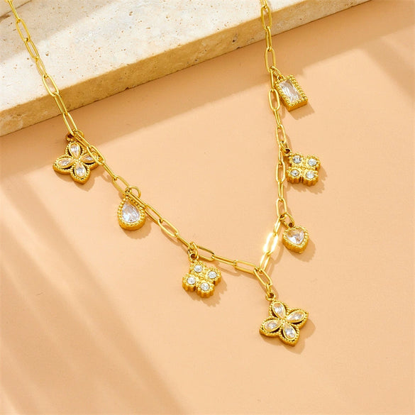 Wholesale Stainless Steel Women's Light Luxury Diamond Water Drop Fourpetal Flower Pendant Collarbone Necklace With Rhinestones And Electroplating