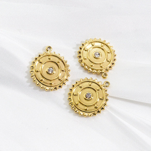 Wholesale Stainless Steel Zircon Inlaid Round Pendant And Earrings With Electroplating Treatment