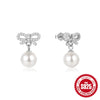 Wholesale 925 Sterling Silver Geometric Bow Pearl Women's Stud Earrings With Electroplating