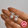 Wholesale 925 Sterling Silver Geometric Bow Pearl Women's Stud Earrings With Electroplating