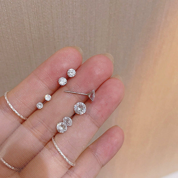Wholesale 925 Sterling Silver High End Geometric Diamond Encrusted Four Claw Zircon Earrings For Pierced Ears With Electroplating