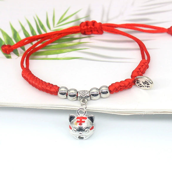 Wholesale Tiger Head Bell Woven Bracelet In Red Rope Alloy Material With Dripping Oil Treatment For Unisex Featuring Animal Zodiac Pattern