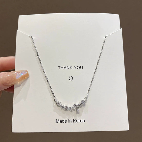 Wholesale Titanium Steel And Alloy Small Flower Pendant Necklace With Diamond Design For Women