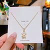 Wholesale Titanium Steel And Copper Women's Minimalist Geometric And Small Flower Pendant Necklace With Electroplating And Cross Chain