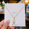 Wholesale Titanium Steel And Copper Women's Minimalist Geometric And Small Flower Pendant Necklace With Electroplating And Cross Chain