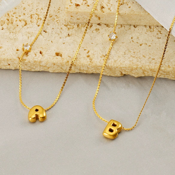 Wholesale Titanium Steel And Stainless Steel Inlaid Zircon Letters Pendant Necklace For Women With Electroplating Treatment