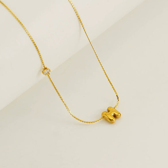 Wholesale Titanium Steel And Stainless Steel Inlaid Zircon Letters Pendant Necklace For Women With Electroplating Treatment