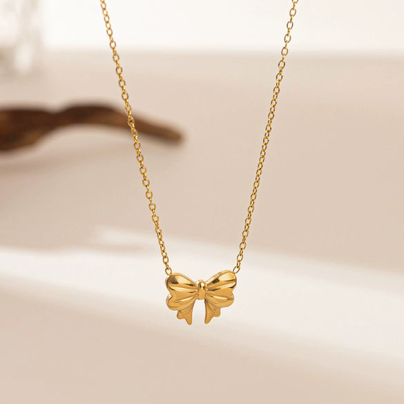 Wholesale Titanium Steel And Stainless Steel Jewelry With Heart Water Drop And Bell Patterns Electroplated Earrings And Ochain Necklaces For Women
