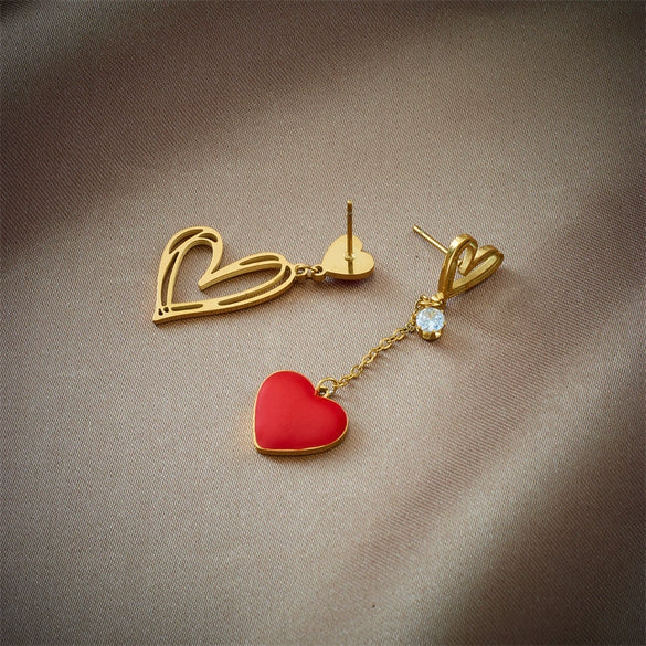 Wholesale Titanium Steel Asymmetric Hollow Heart Shape Hanging Earrings For Women With Electroplating Treatment