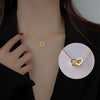 Wholesale Titanium Steel Double Ring Heart Shaped Clavicle Chain Necklace With 18K Gold Electroplating