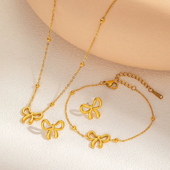 Wholesale Titanium Steel Earring Set Clavicle Chain And Bracelet With Bow Tie Styling And Electroplating