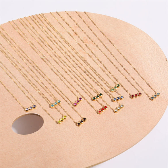 Wholesale Titanium Steel Electroplated Geometric Three Round Zircon Inlaid Birthday Stone Pendant Necklace For Women