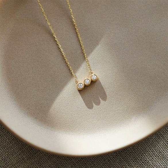 Wholesale Titanium Steel Electroplated Geometric Three Round Zircon Inlaid Birthday Stone Pendant Necklace For Women