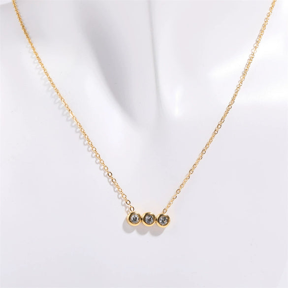 Wholesale Titanium Steel Electroplated Geometric Three Round Zircon Inlaid Birthday Stone Pendant Necklace For Women