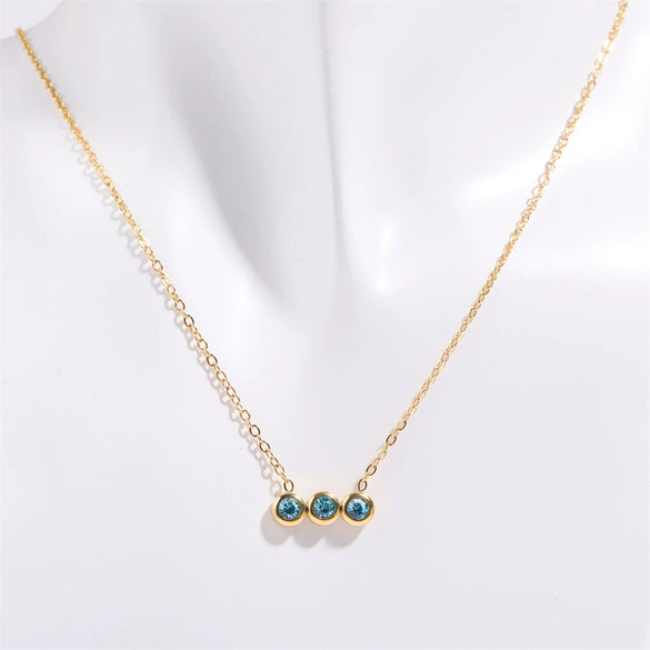 Wholesale Titanium Steel Electroplated Geometric Three Round Zircon Inlaid Birthday Stone Pendant Necklace For Women