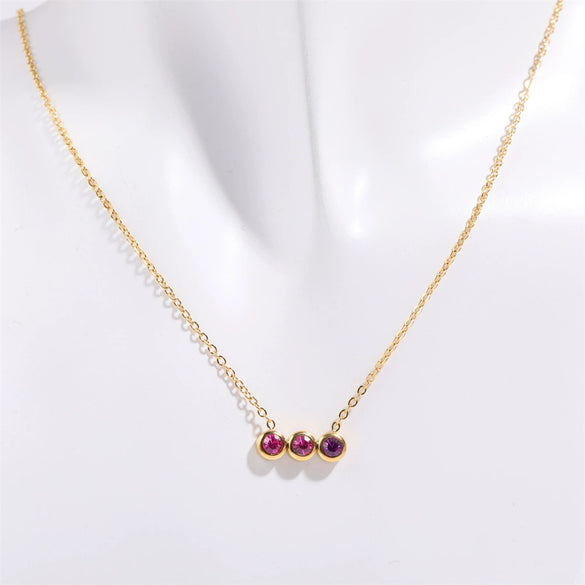 Wholesale Titanium Steel Electroplated Geometric Three Round Zircon Inlaid Birthday Stone Pendant Necklace For Women
