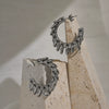 Wholesale Titanium Steel Flower Pattern Vintage Style Electroplated Earrings For Women