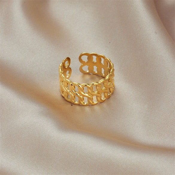 Wholesale Titanium Steel Geometric Cross Eightword Twist Hollow Women's Ring With Electroplating