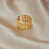 Wholesale Titanium Steel Geometric Cross Eightword Twist Hollow Women's Ring With Electroplating
