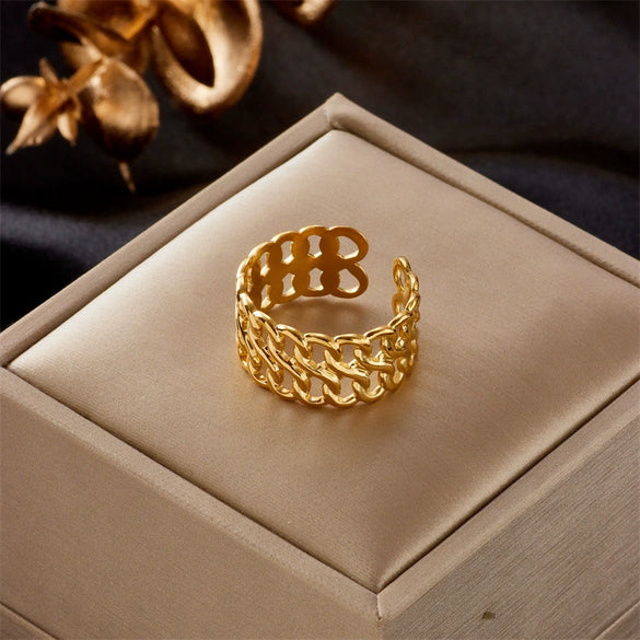 Wholesale Titanium Steel Geometric Cross Eightword Twist Hollow Women's Ring With Electroplating