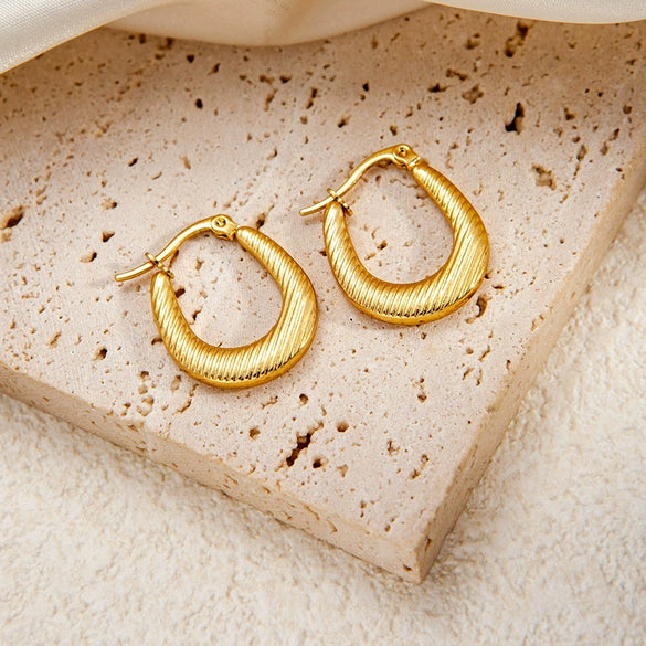 Wholesale Titanium Steel Geometric Oval Earrings With Electroplating And High Sense Geometric Line Texture For Women