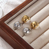 Wholesale Titanium Steel Geometric Retro Football Style Electroplated Earrings For Women
