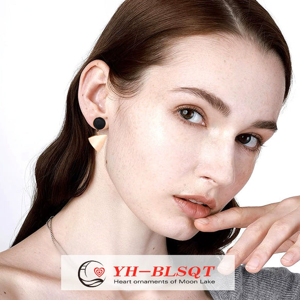 Wholesale Titanium Steel Geometric Retro Fun Triangle Women's Earrings With Electroplating