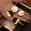 Wholesale Titanium Steel Geometric Round Retro High Grade Black And White Electroplated Unisex Earrings
