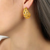 Wholesale 316L Stainless Steel Goldplated Dropshaped Hollow Stud Earrings Fashion Design Jewelry Unisex