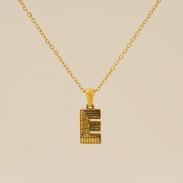 Wholesale Titanium Steel Goldplated Jewelry With Bark Pattern And English Letter Pendant Necklace Fashion Style Unisex