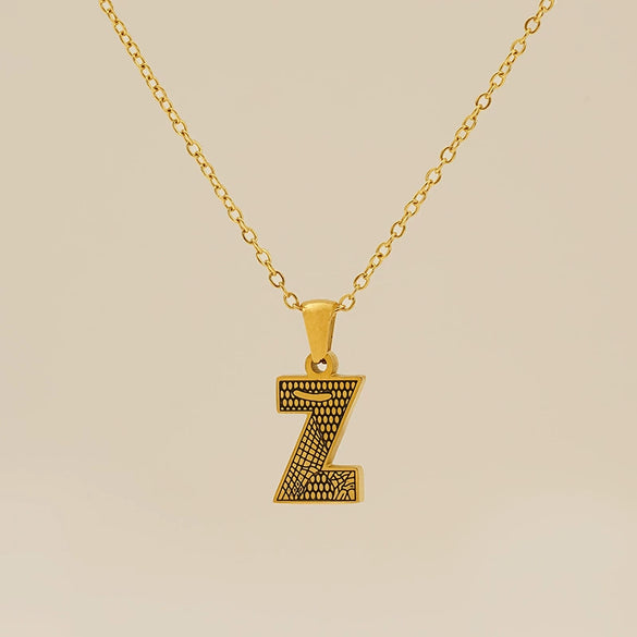 Wholesale Titanium Steel Goldplated Jewelry With Bark Pattern And English Letter Pendant Necklace Fashion Style Unisex