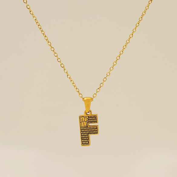 Wholesale Titanium Steel Goldplated Jewelry With Bark Pattern And English Letter Pendant Necklace Fashion Style Unisex
