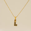 Wholesale Titanium Steel Goldplated Jewelry With Bark Pattern And English Letter Pendant Necklace Fashion Style Unisex