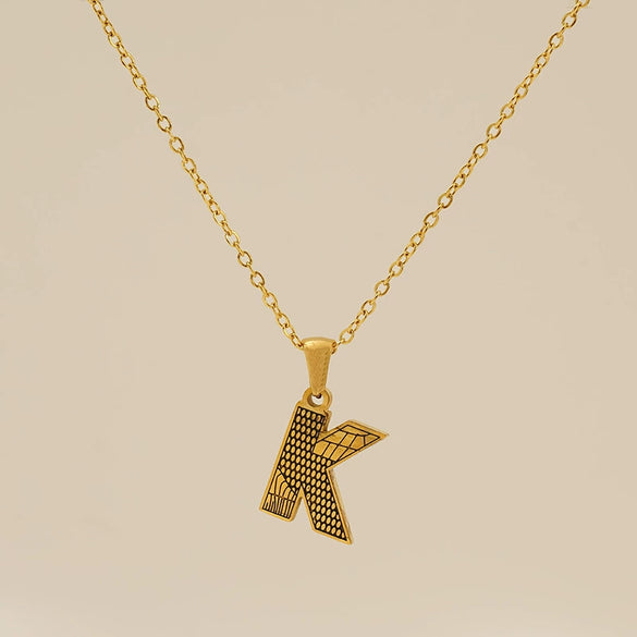 Wholesale Titanium Steel Goldplated Jewelry With Bark Pattern And English Letter Pendant Necklace Fashion Style Unisex