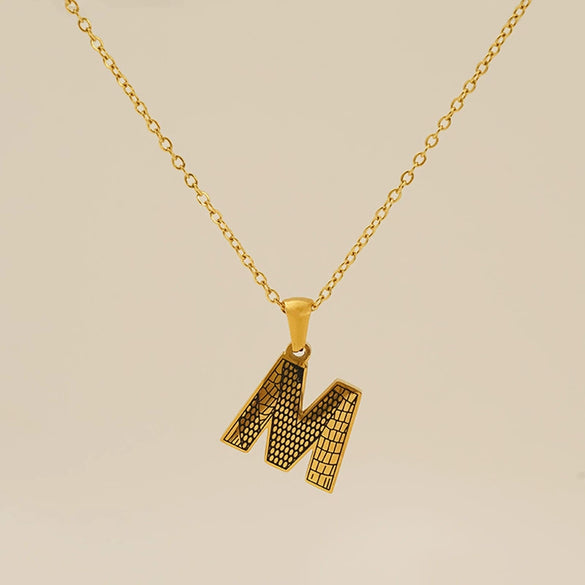Wholesale Titanium Steel Goldplated Jewelry With Bark Pattern And English Letter Pendant Necklace Fashion Style Unisex