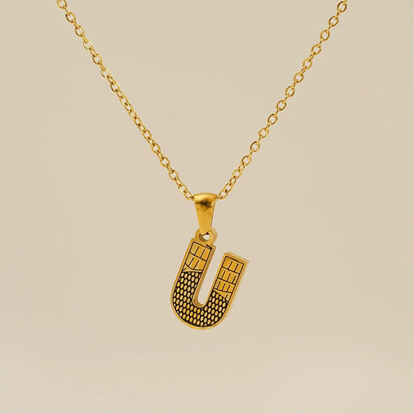 Wholesale Titanium Steel Goldplated Jewelry With Bark Pattern And English Letter Pendant Necklace Fashion Style Unisex