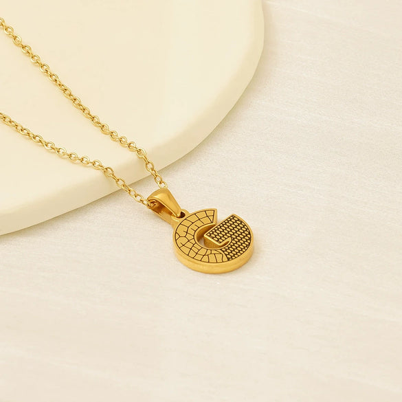 Wholesale Titanium Steel Goldplated Jewelry With Bark Pattern And English Letter Pendant Necklace Fashion Style Unisex
