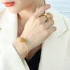 Wholesale Titanium Steel Goldplated Love Shape Jewelry Set Including Adjustable Coil Bracelet And Trendy Ring