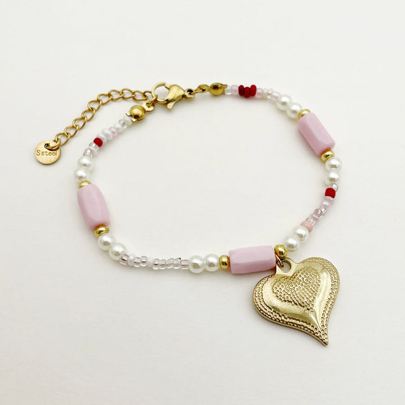 Wholesale Titanium Steel Heart Shape Embossed Necklace And Bracelet Set With Electroplating
