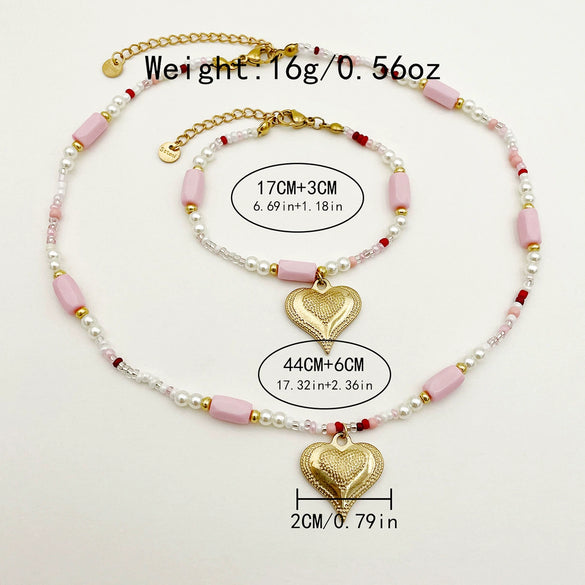 Wholesale Titanium Steel Heart Shape Embossed Necklace And Bracelet Set With Electroplating