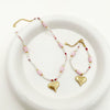 Wholesale Titanium Steel Heart Shape Embossed Necklace And Bracelet Set With Electroplating