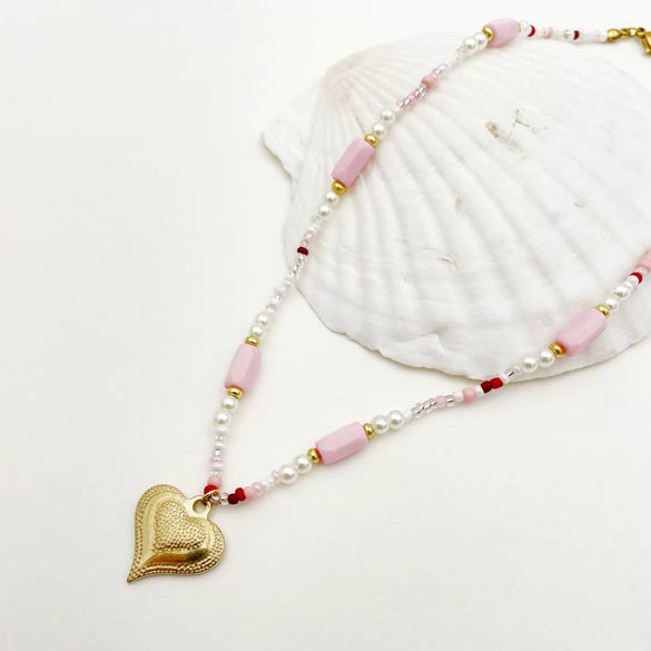 Wholesale Titanium Steel Heart Shape Embossed Necklace And Bracelet Set With Electroplating