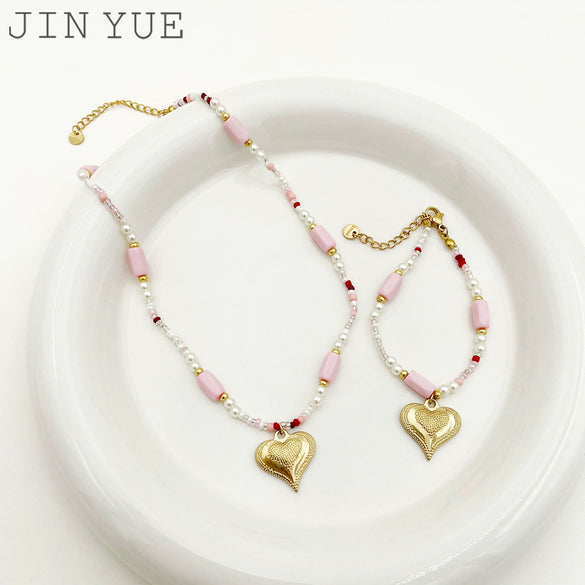 Wholesale Titanium Steel Heart Shape Embossed Necklace And Bracelet Set With Electroplating