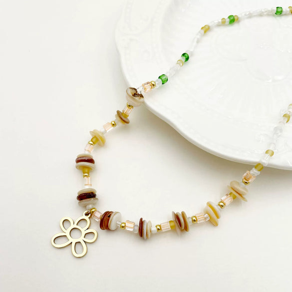 Wholesale Titanium Steel Irregular Hollow Flower Handmade Beaded Necklace And Bracelet Set With Electroplating For Women