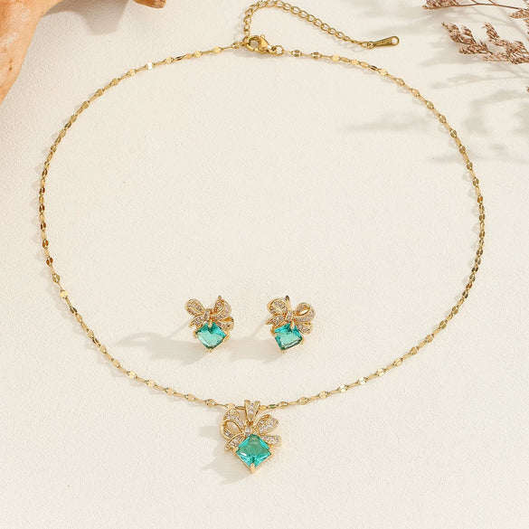 Wholesale Titanium Steel Jewelry For Women With Bow Pendant Electroplating Mixed Gemstone Setting And O Word Chain