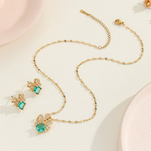 Wholesale Titanium Steel Jewelry For Women With Bow Pendant Electroplating Mixed Gemstone Setting And O Word Chain