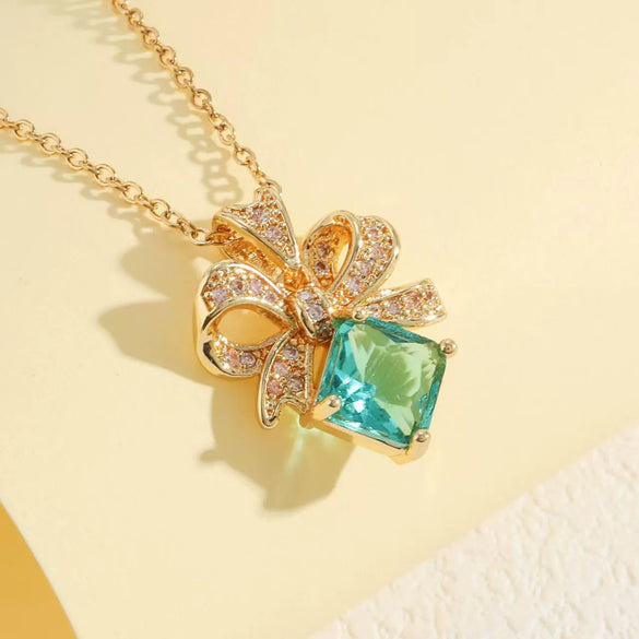 Wholesale Titanium Steel Jewelry For Women With Bow Pendant Electroplating Mixed Gemstone Setting And O Word Chain