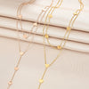 Wholesale Titanium Steel Multilayer Long Tassel Love Chain Stacking Necklace With Geometric Pattern And Electroplating