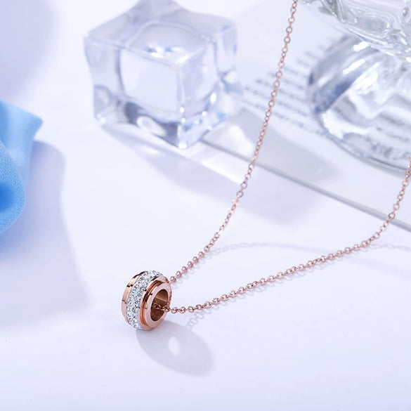 Wholesale Titanium Steel Necklace With Diamond Encrusted Geometric Style Rotating Rose Gold Drill Cross Chain Design
